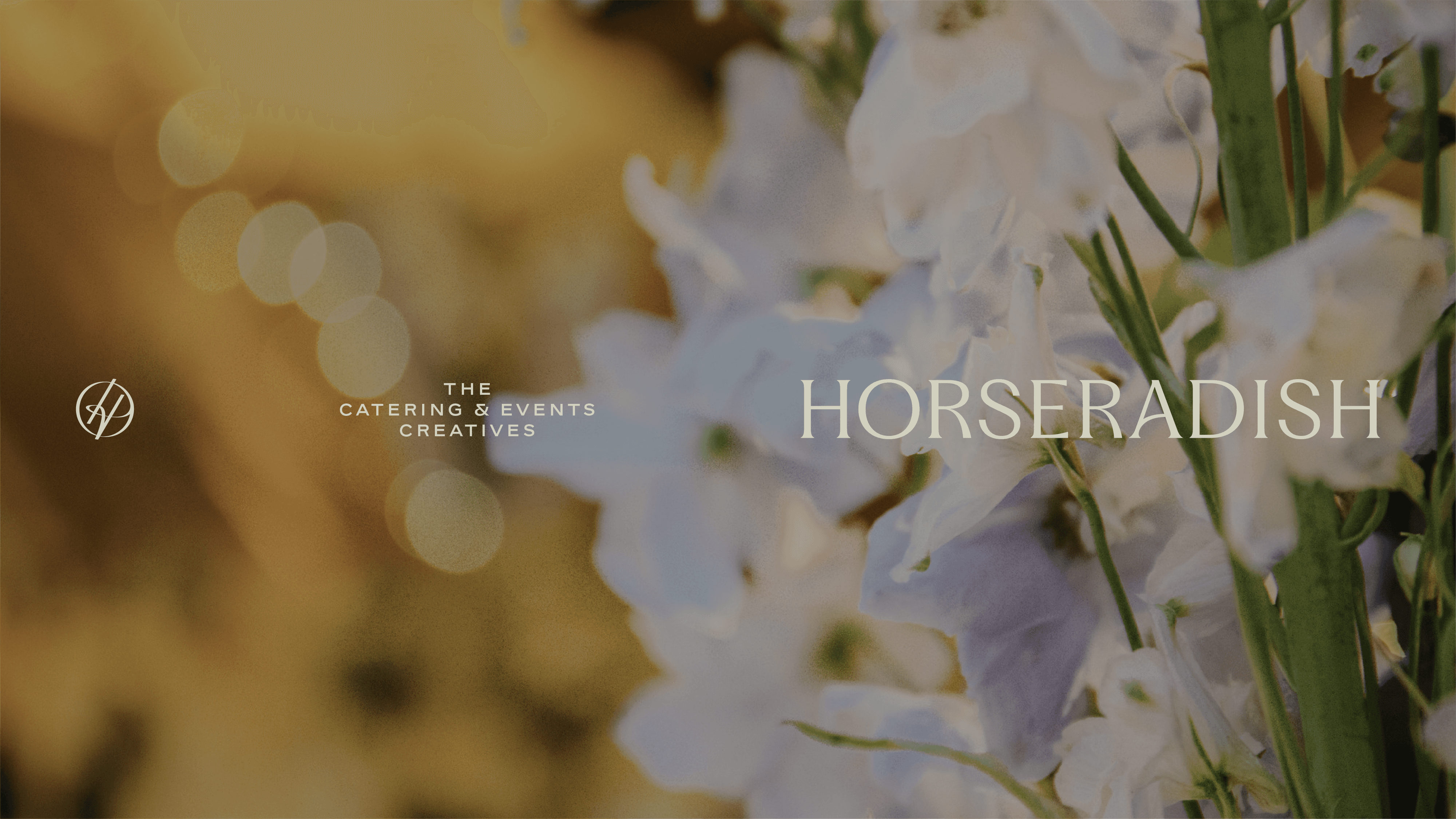 Horseradish wordmark and monogram over a soft-focus shot of pale flowers